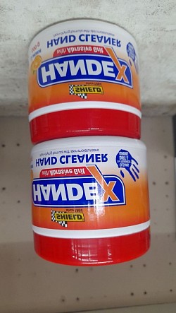 Hand cleaner with grid